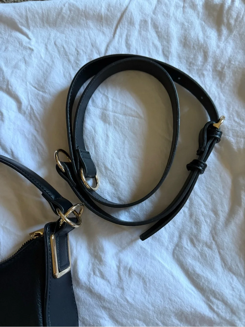 Elegant Black Leather Shoulder Bag with Gold Hardware